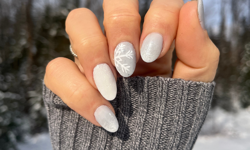 dip nail ideas for winter with snowflake nail art and glitter
